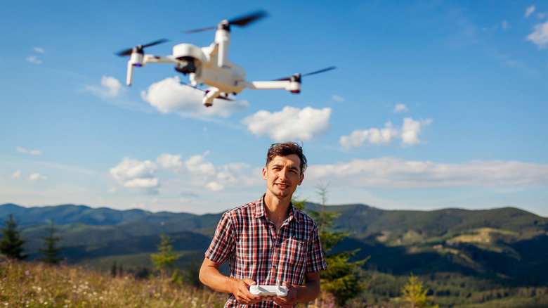 Man flying a drone