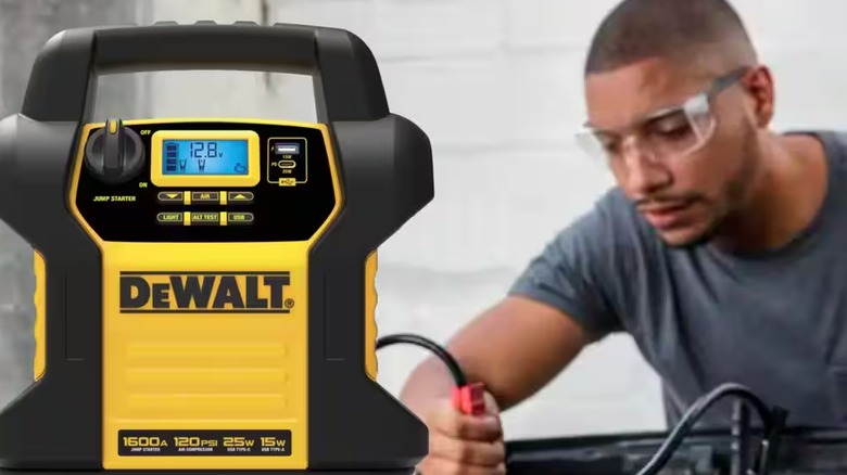 Man using DeWalt portable jumper