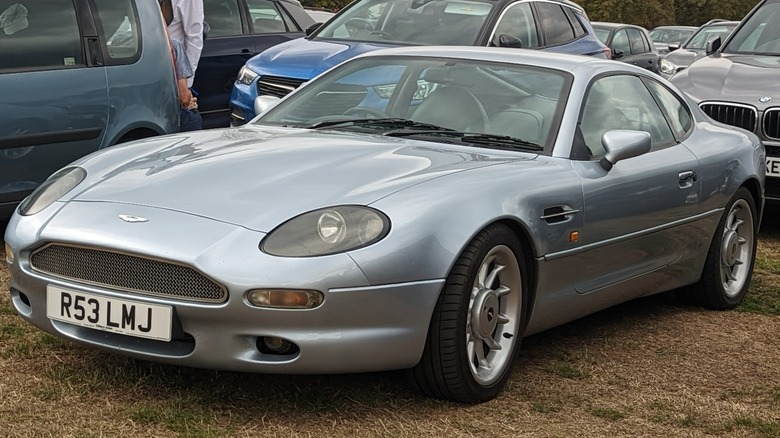 Silver Aston Martin DB7 parked