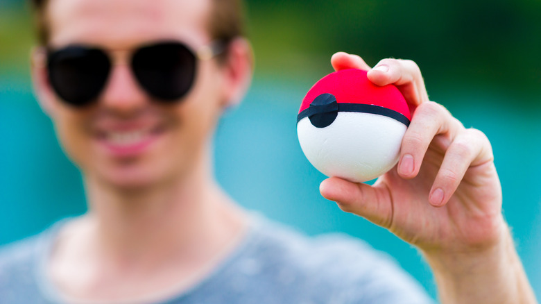 Man holding pokeball