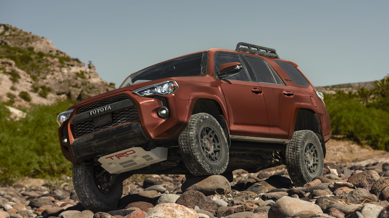 Red 2024 Toyota 4Runner on rocks