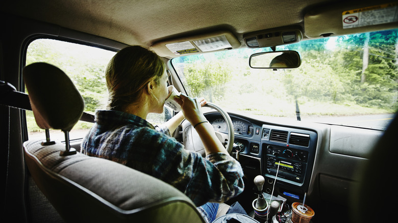 Woman in pickup truck