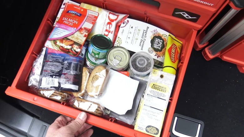 Food and snacks in a three-drawer Milwaukee Packout toolbox