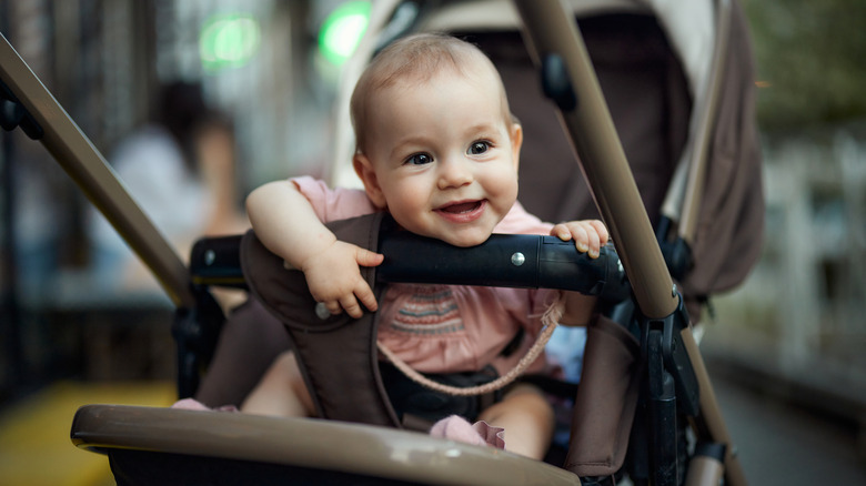 Happy baby in stroller