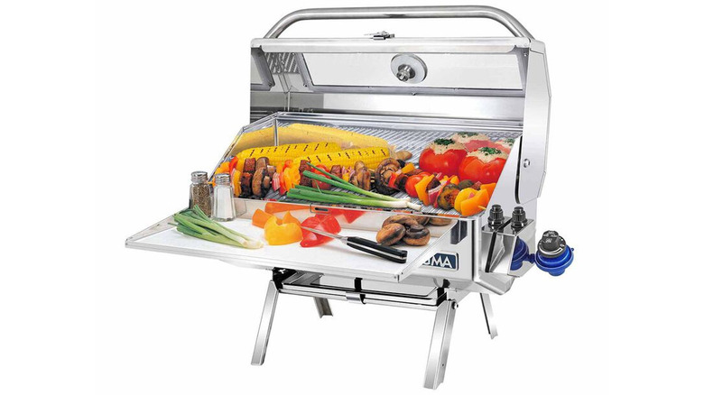 magma gas grill with food