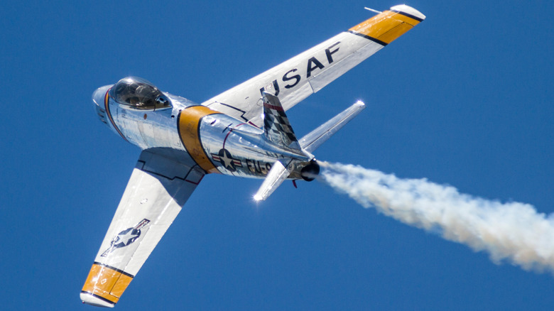 A North American F-86 Sabre flying over blue skies at the Thunder Over Michigan Airshow in August 2012