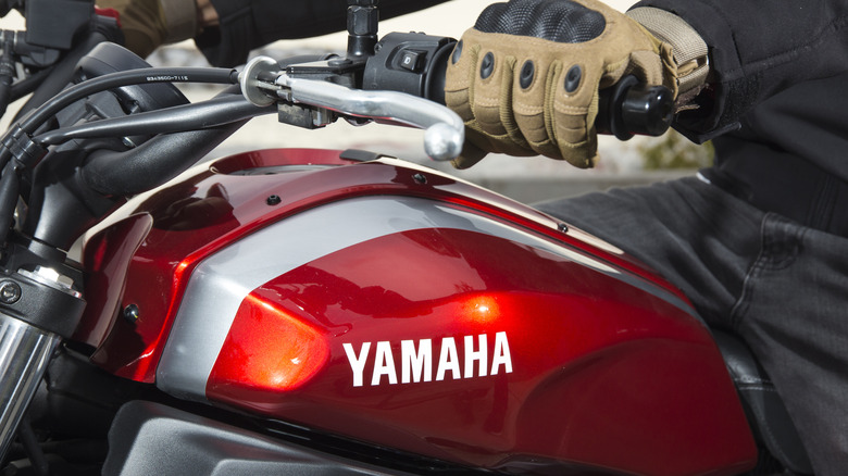 person riding yamaha motorcycle