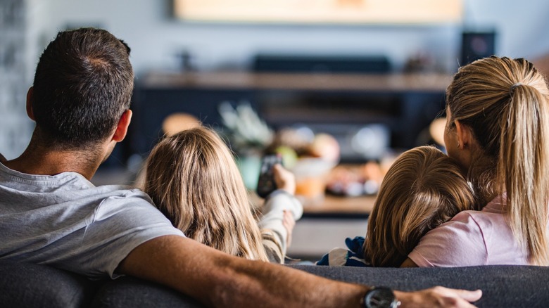 family watching TV together