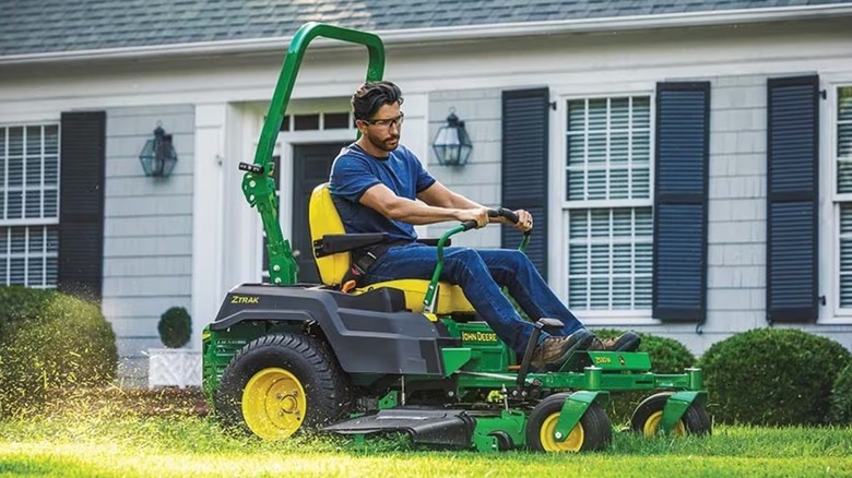 Man on John Deere Z530M mowing grass