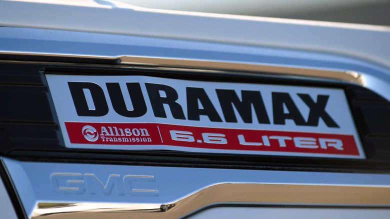 The 6.6-liter Duramax/Allison Transmission logo on a GMC pickup