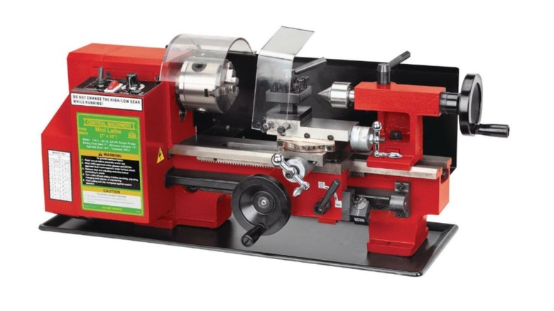 Red mini lathe with Central Machinery stamp on front.