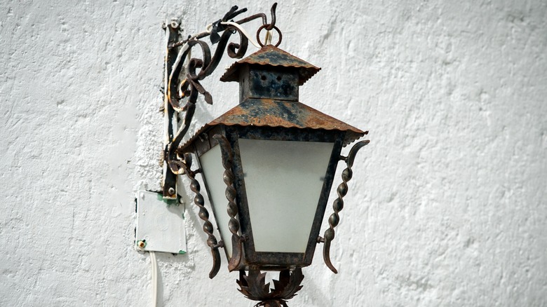 Rusted outdoor light fixture