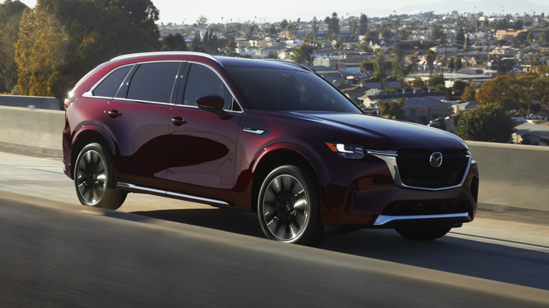 2025 Mazda CX-90 driving on the highway