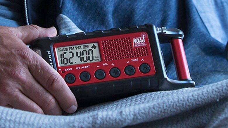 Midland radio in persons hand