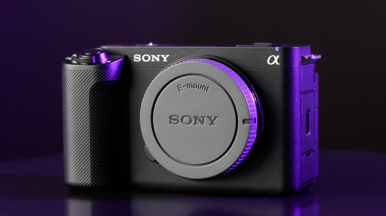 Sony Alpha ZVE10 II with a lens cap kept on a table