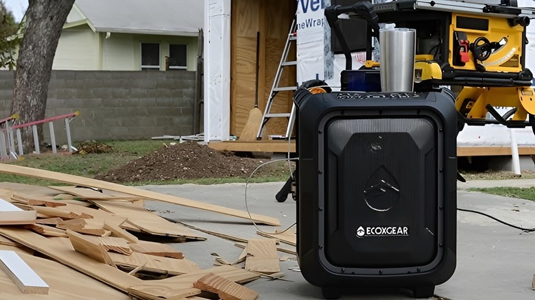 EcoxGear speaker sitting on pavement