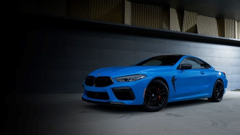 Front-left quarter shot of a Blue 2025 BMW M5 Competition Coupe