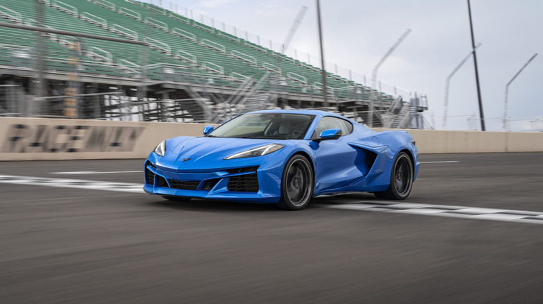 Blue 2024 Chevrolet Corvette E-Ray on a test track