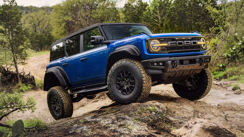 blue 2025 Ford Bronco in dry river bed