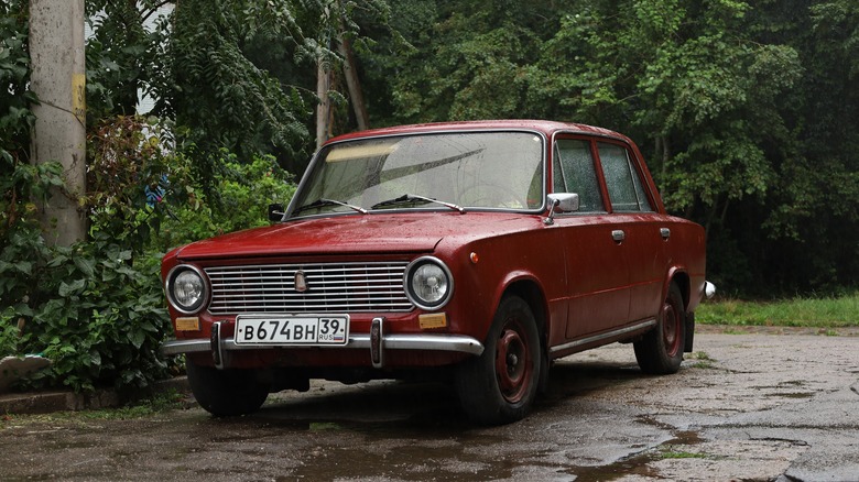 Red Lada Zhiguli parked on street