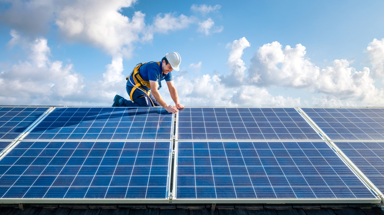 Solar panels with a cloudy sky