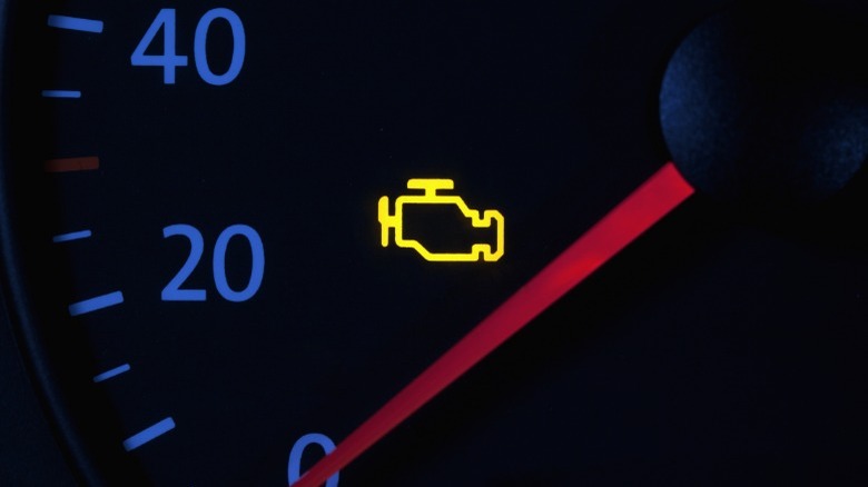 A car's check engine light.