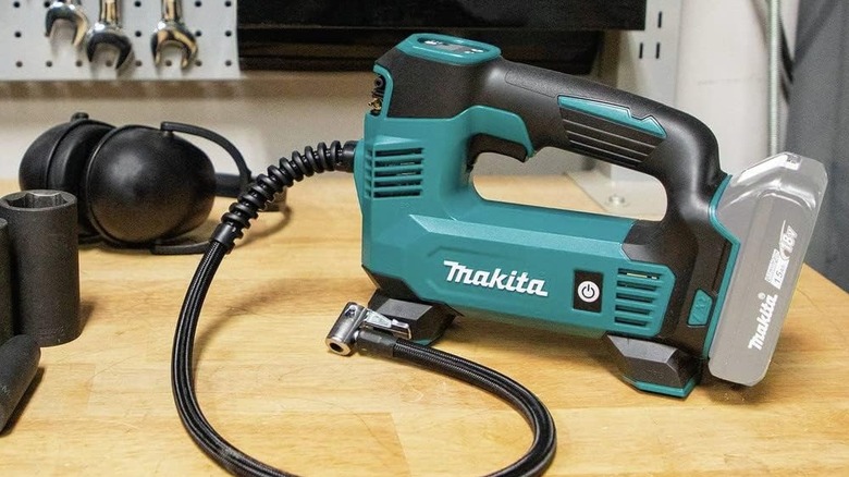 Makita inflator tool sitting on a table