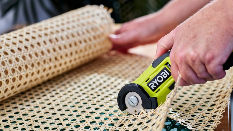 Ryobi USB Lithium Power Cutter cutting rug pad