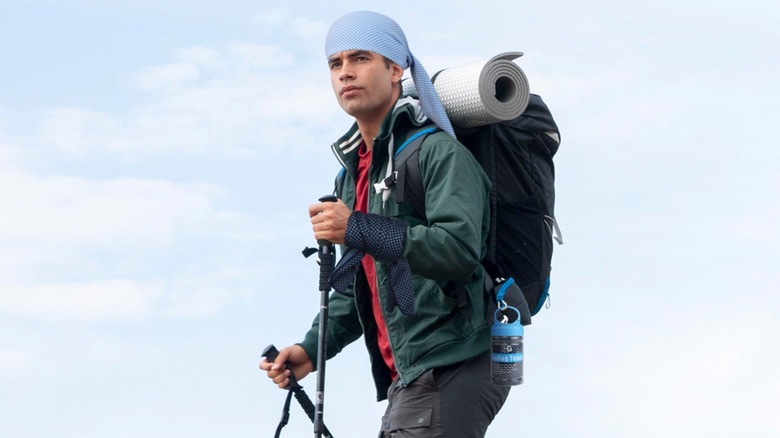 Man with cooling towel wrapped around his head