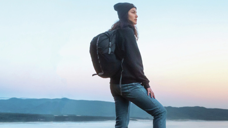 Woman taking a break while hiking 