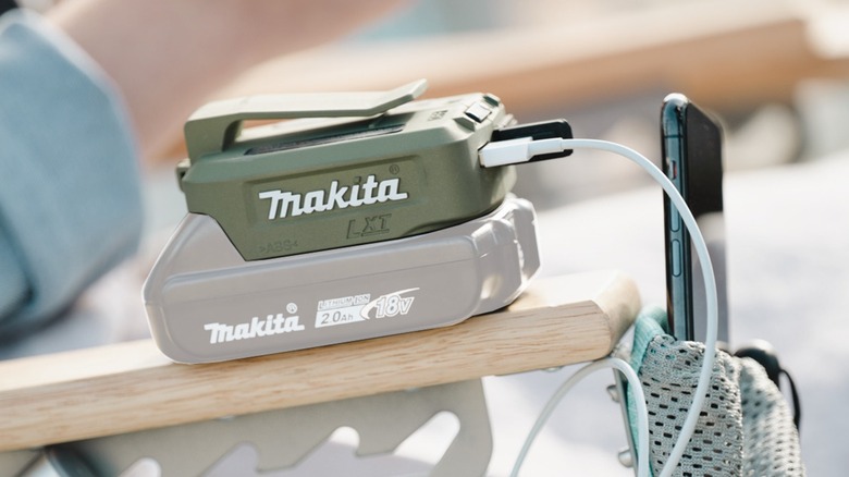 The Makita 18-volt cordless power source powers and charges USB devices.