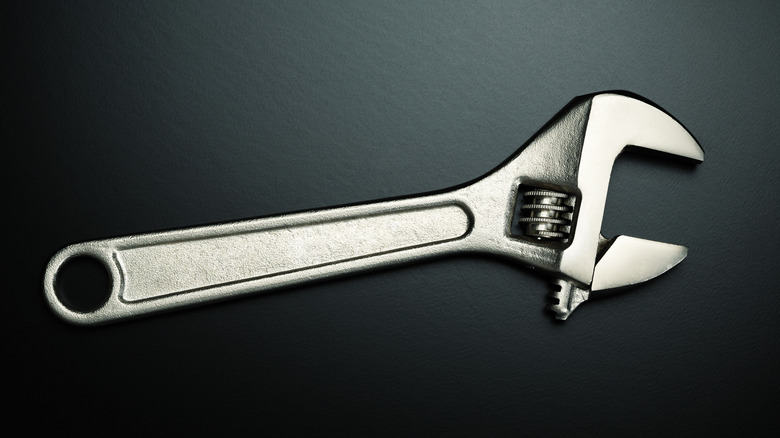 A crescent/adjustable wrench