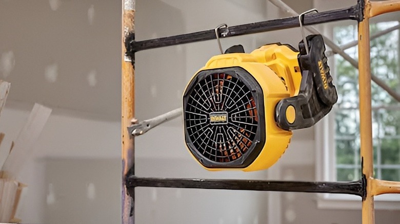 DeWalt fan hanging on a bar