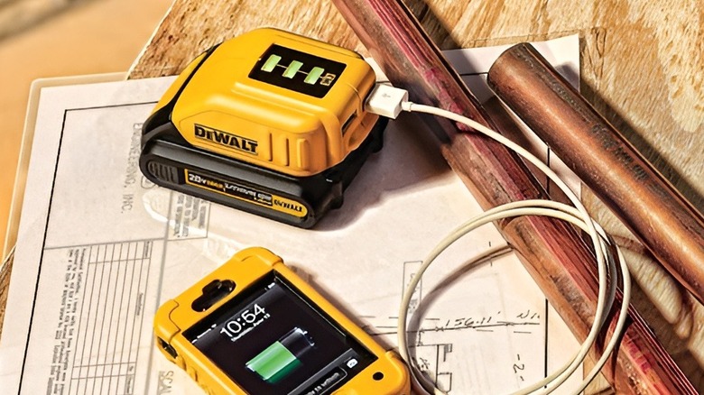 Phone being charged on DeWalt charger