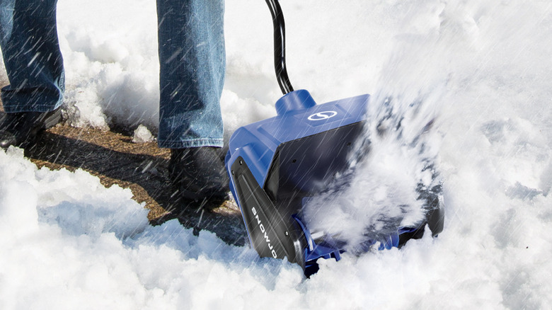 Snow Joe Cordless Snow Shovel in snow