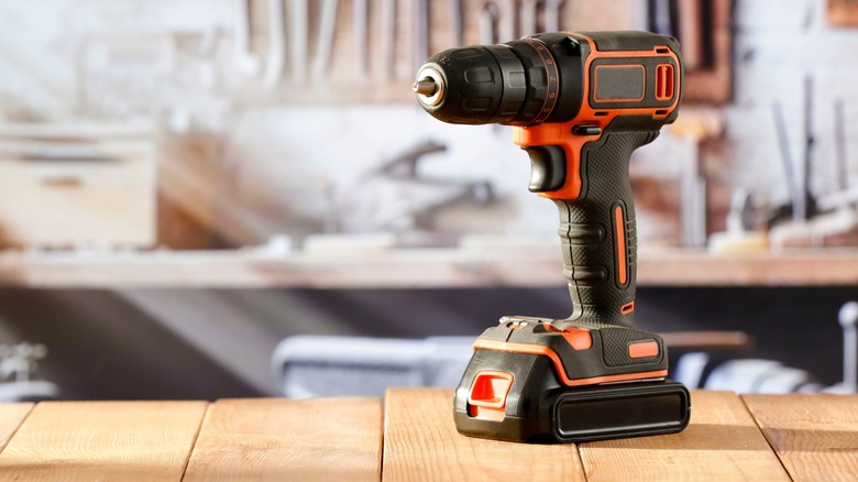 a cordless drill on a table