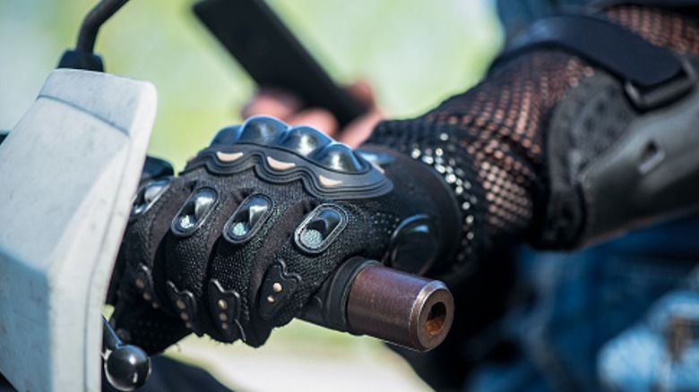 motorcyclist wearing gloves