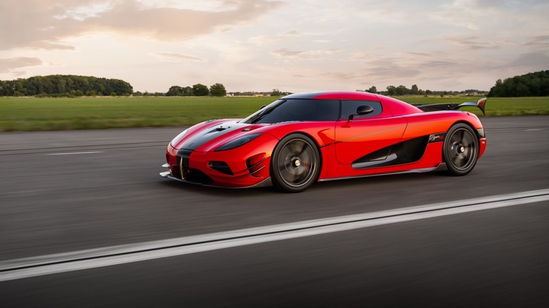 A red Koenigsegg Agera RS driving