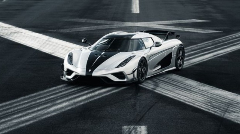 A Koenigsegg Regera on a giant letter X