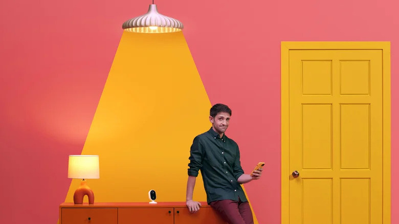 Man with Wiz device on table and light