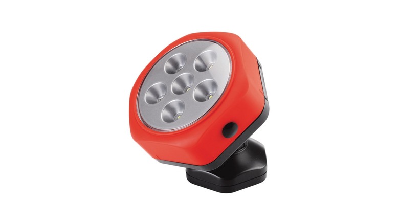 A red Harbor Freight rotating magnetic work light on a white background