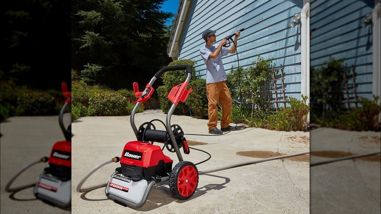 person using bauer pressure washer