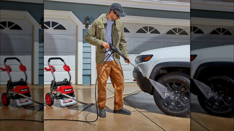 person using bauer pressure washer