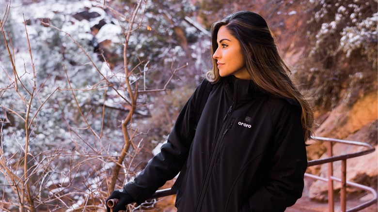 Woman wearing heated jacket