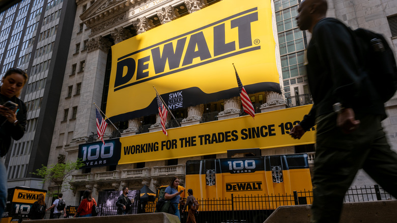 DeWalt anniversary signage on an urban building