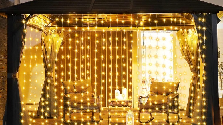 An image of a gazebo with Zaiyw outdoor curtain lights installed