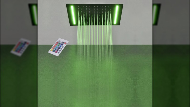 A Cascada showers recessed rainfall shower showing green led mood lighting