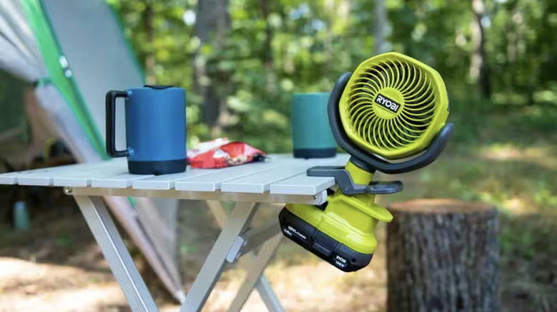 Fan clipped to camping table