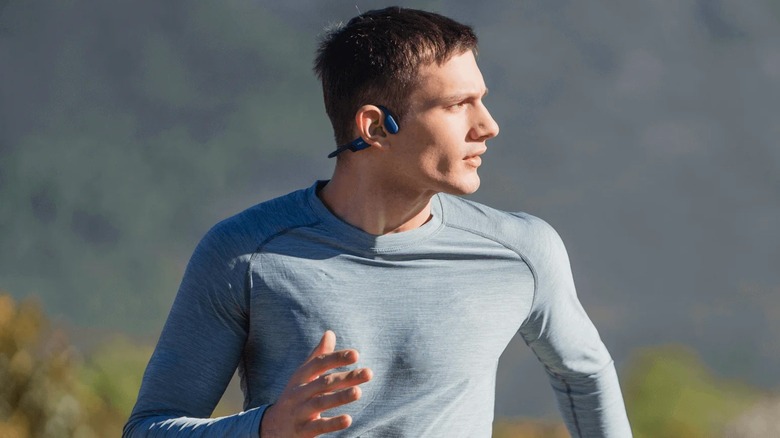 Shokz Open Run headphones man