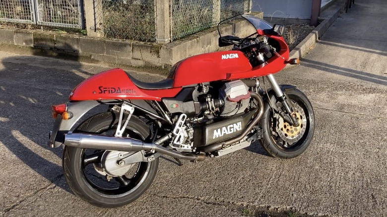 A red Magni Sfida 1100ie 5640 motorcycle